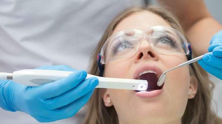 Female patient in Southampton NY receiving dental treatment