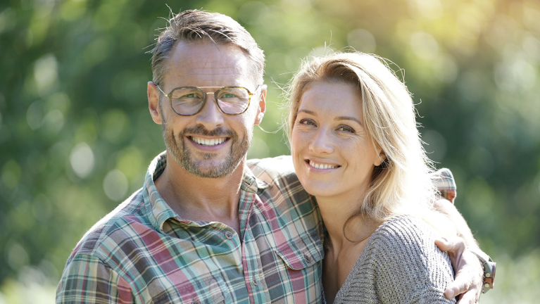 Couple in Southampton smiling with their front dental crowns