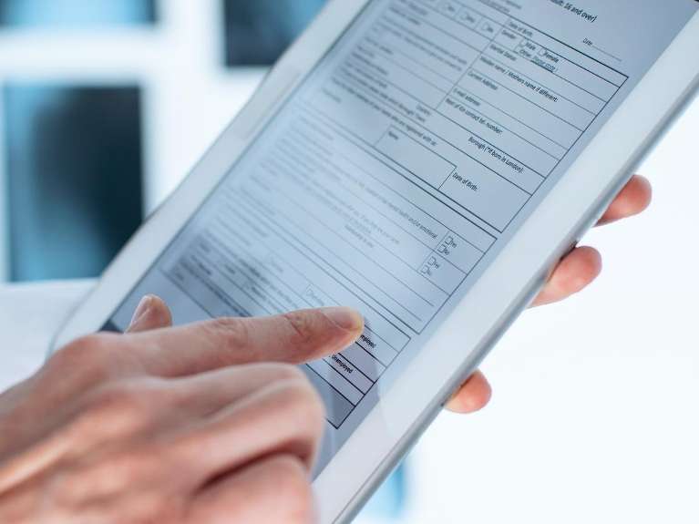 close up of tablet with digital records | southampton dentist
