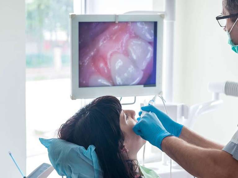 patient receiving dental exam | southampton dentist